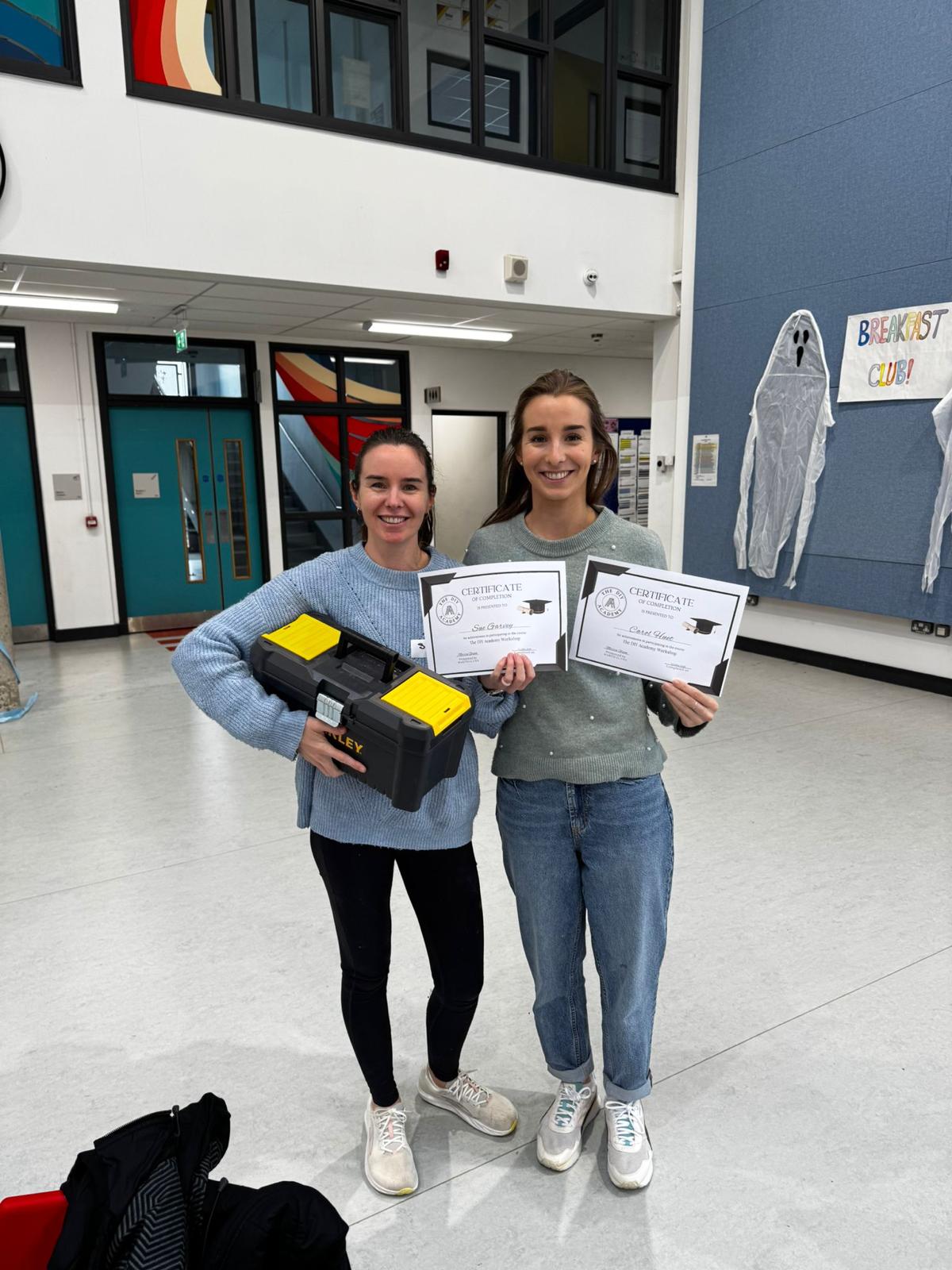 Tranistion Year students show off their DIY certificates received from The DIY Academy